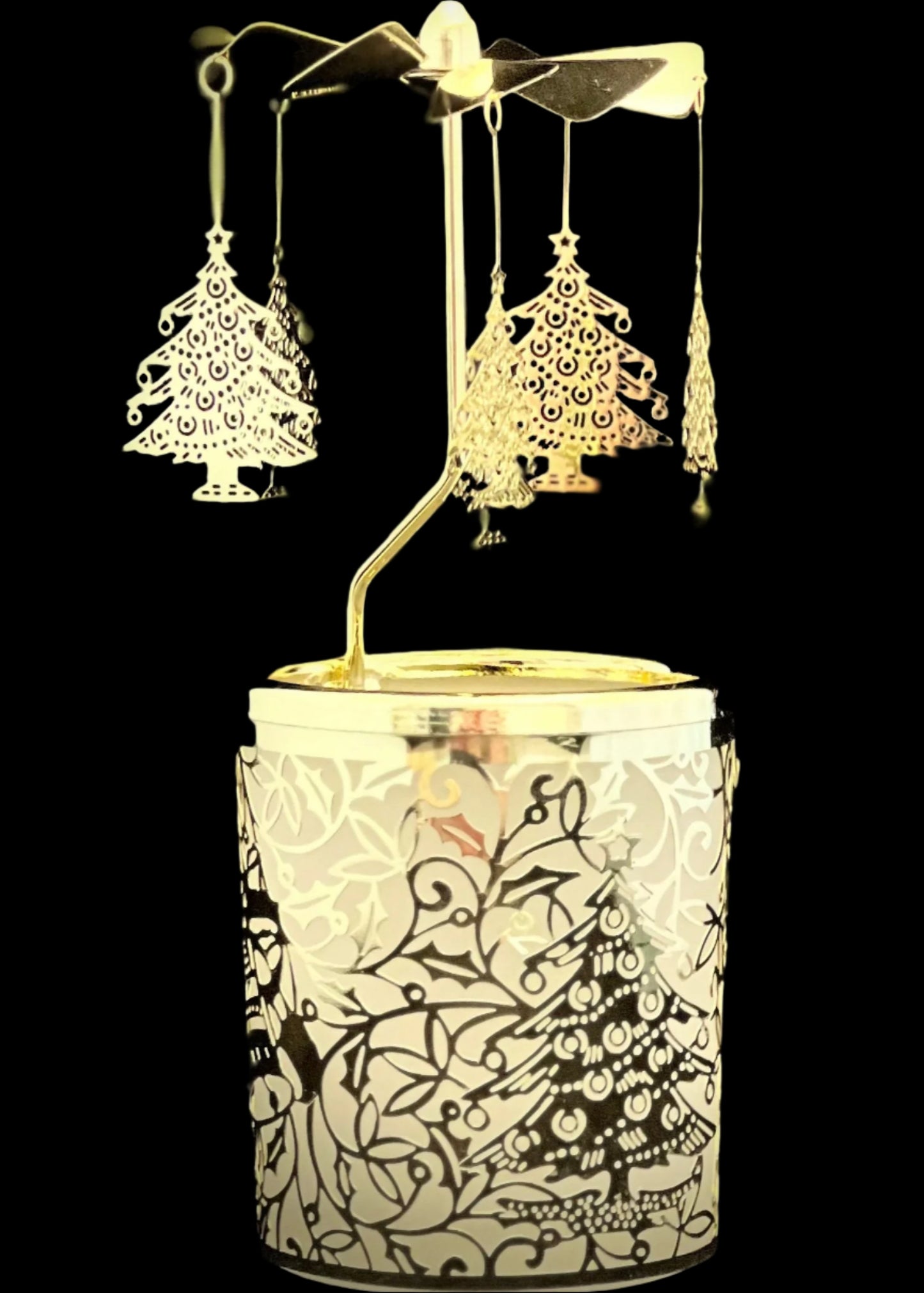Decorative lantern with tree-shaped ornaments on a black background
