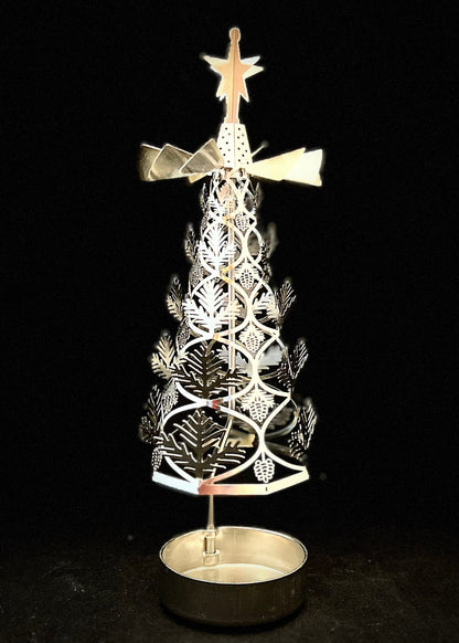Decorative Christmas tree with star on top against a black background