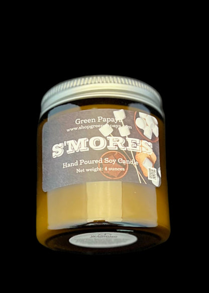 Jar of 'S'mores' candle with a label on a dark background