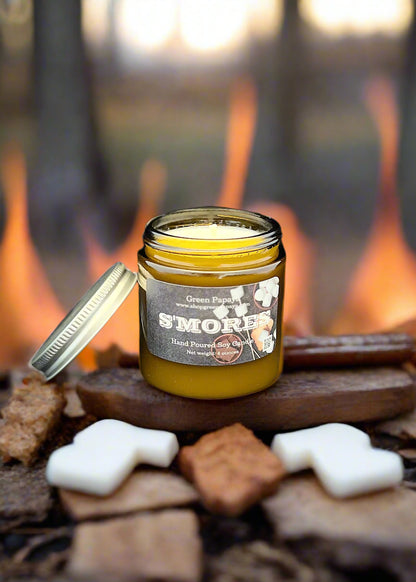 Jar of 'S'mores' candle with a label on a black background
