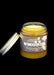 S'mores candle in a jar with a label on a dark background