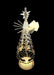 Decorative Christmas tree with a star on top, illuminated against a black background