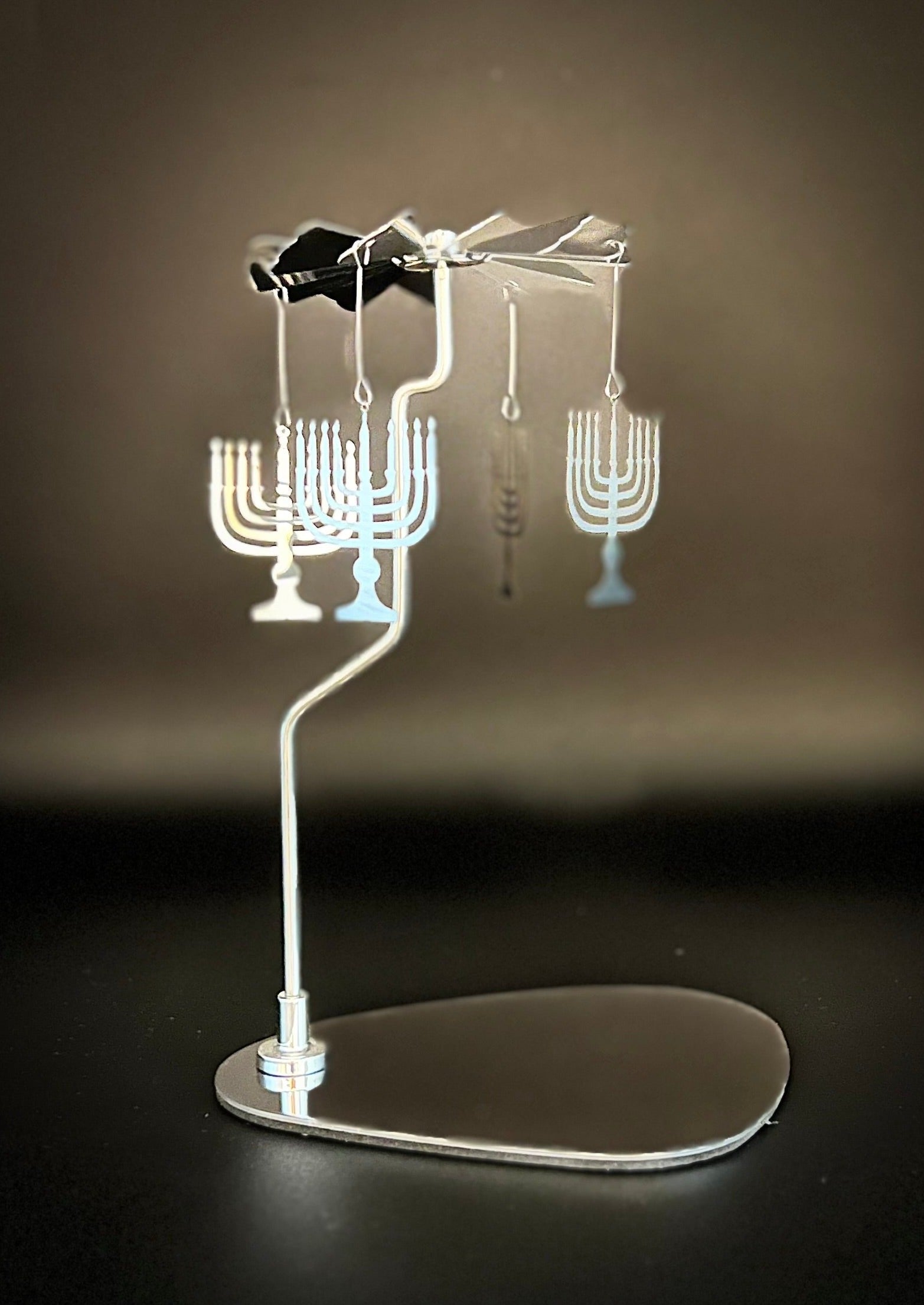 Candle Carousel - The Hanukkah Menorah